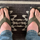 My feet breathing happy in their OluKai Ohanas
